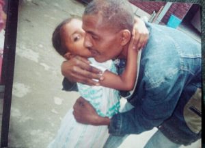 Selamawit kissing her father at the orphanage